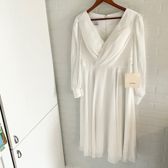 White Wedding Dress with Timeless Elegance - Picture 6 of 16